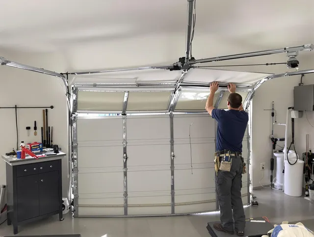 Reynoldsburg Garage Door Repair specialist performing precise section replacement on Reynoldsburg garage door