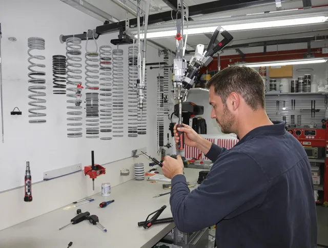 Reynoldsburg Garage Door Repair safety certified technician performing precision spring replacement in Reynoldsburg