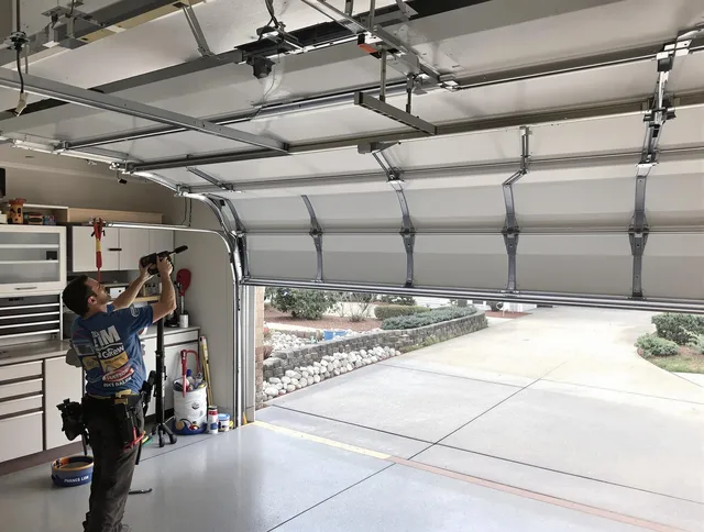 Garage door track repair service by Reynoldsburg Garage Door Repair in Reynoldsburg